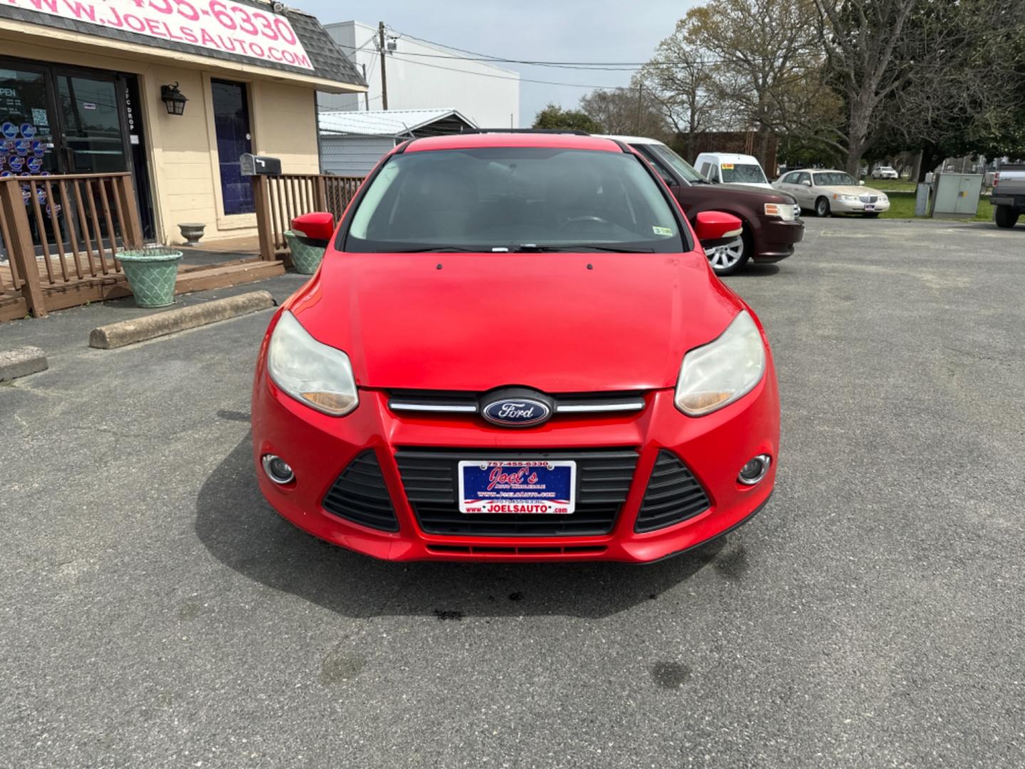 2014 Red Ford Focus (1FADP3K21EL) , Automatic transmission, located at 5700 Curlew Drive, Norfolk, VA, 23502, (757) 455-6330, 36.841885, -76.209412 - Photo#4